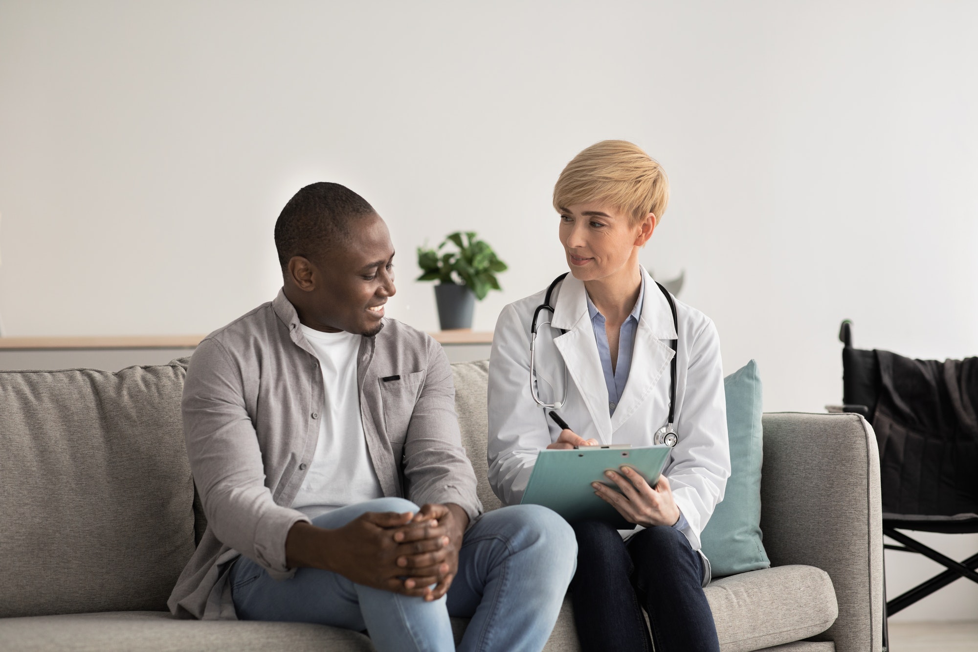 Health care, medical examination of disabled person in clinic, home